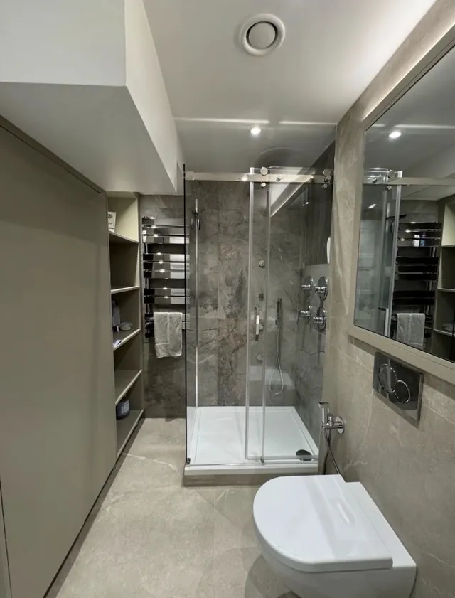 Shower room with built-in shelving