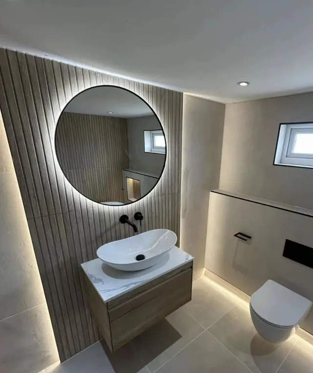 Backlit mirror and countertop basin