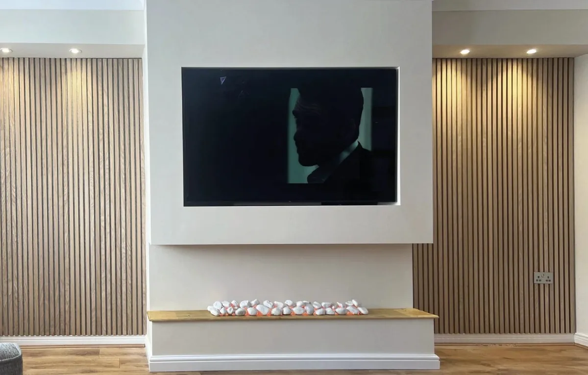 Media wall with timber slats