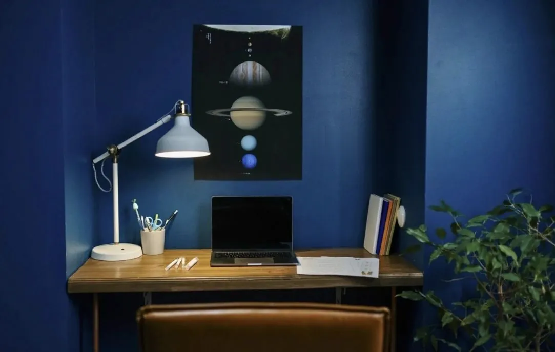 Study nook painted in deep blue
