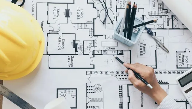 Architect plans, pencil and hard hat